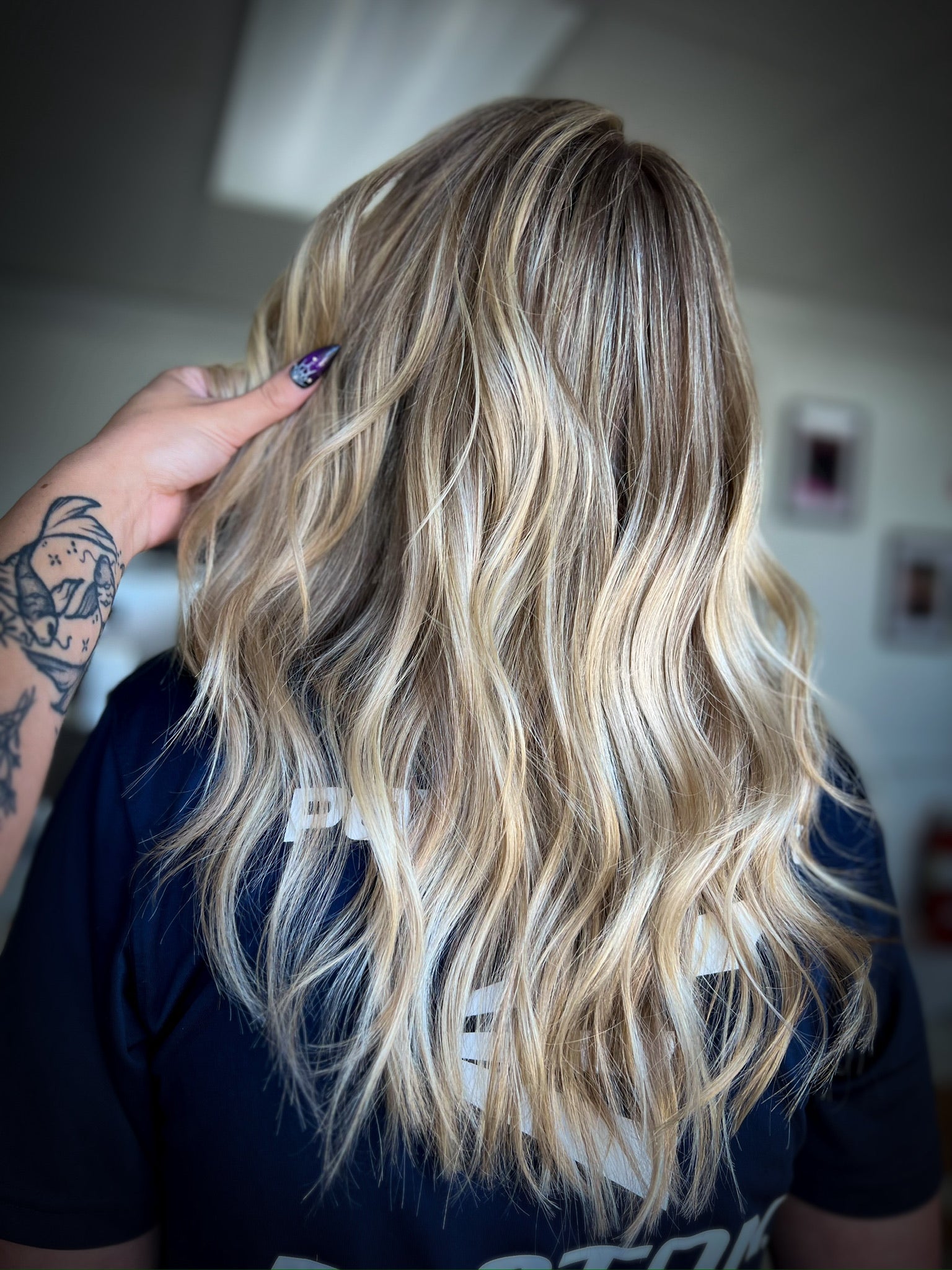 highlighted blonde hair curled 