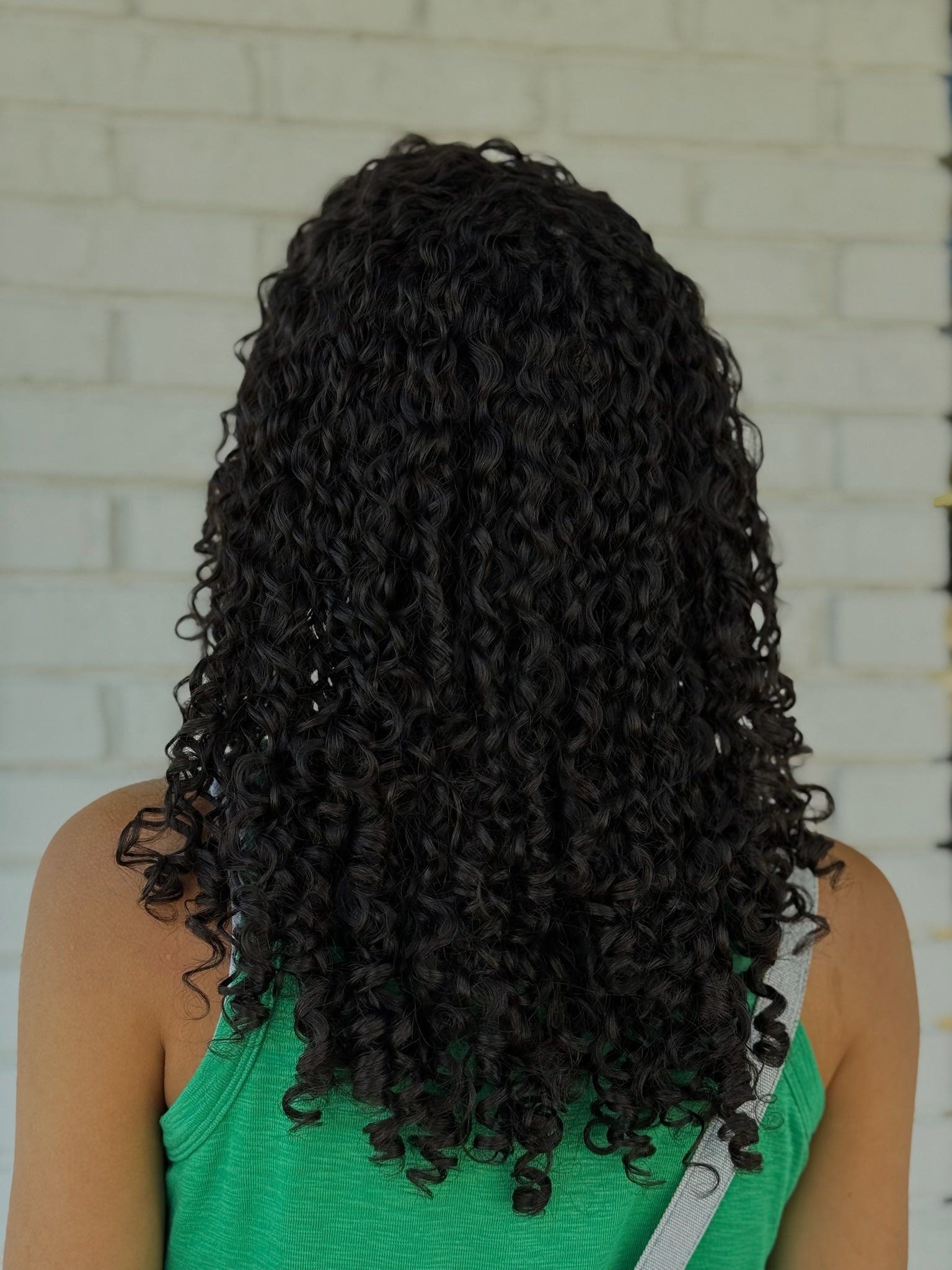 tight defined curly hair 