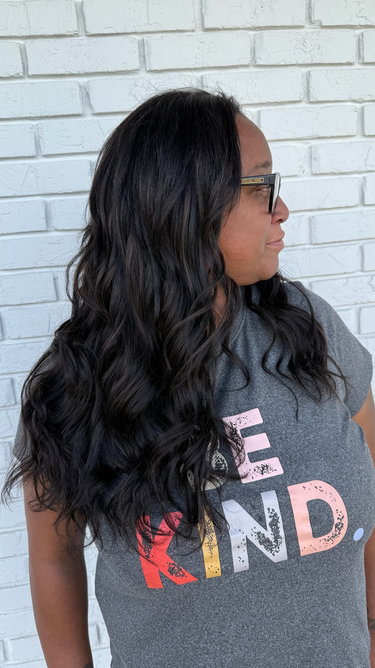 long dark brunette k-tip extensions in hair 