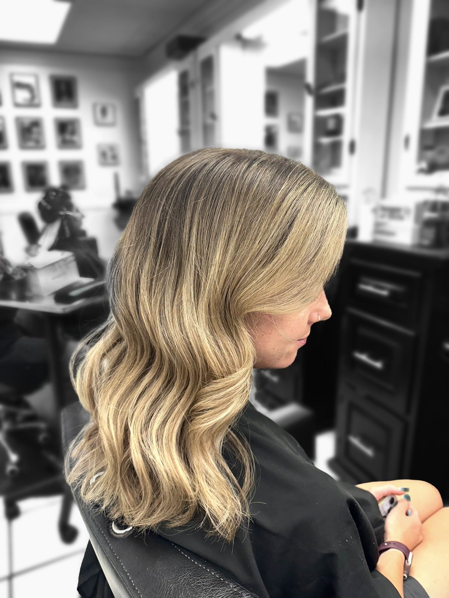 curled blonde highlighted hair 